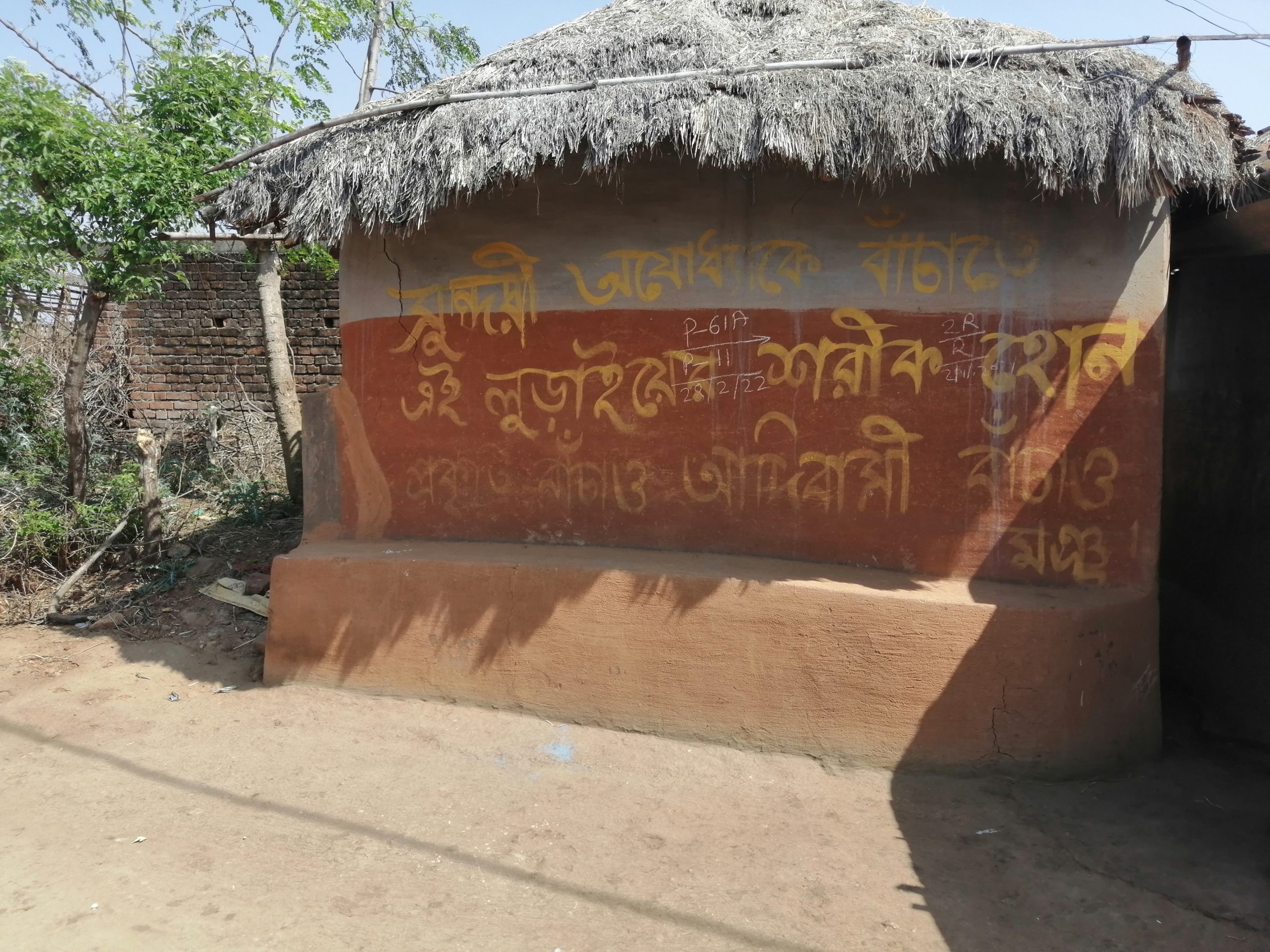 A house in Ranga village painted with a message protesting the Turga Pumped Storage Project