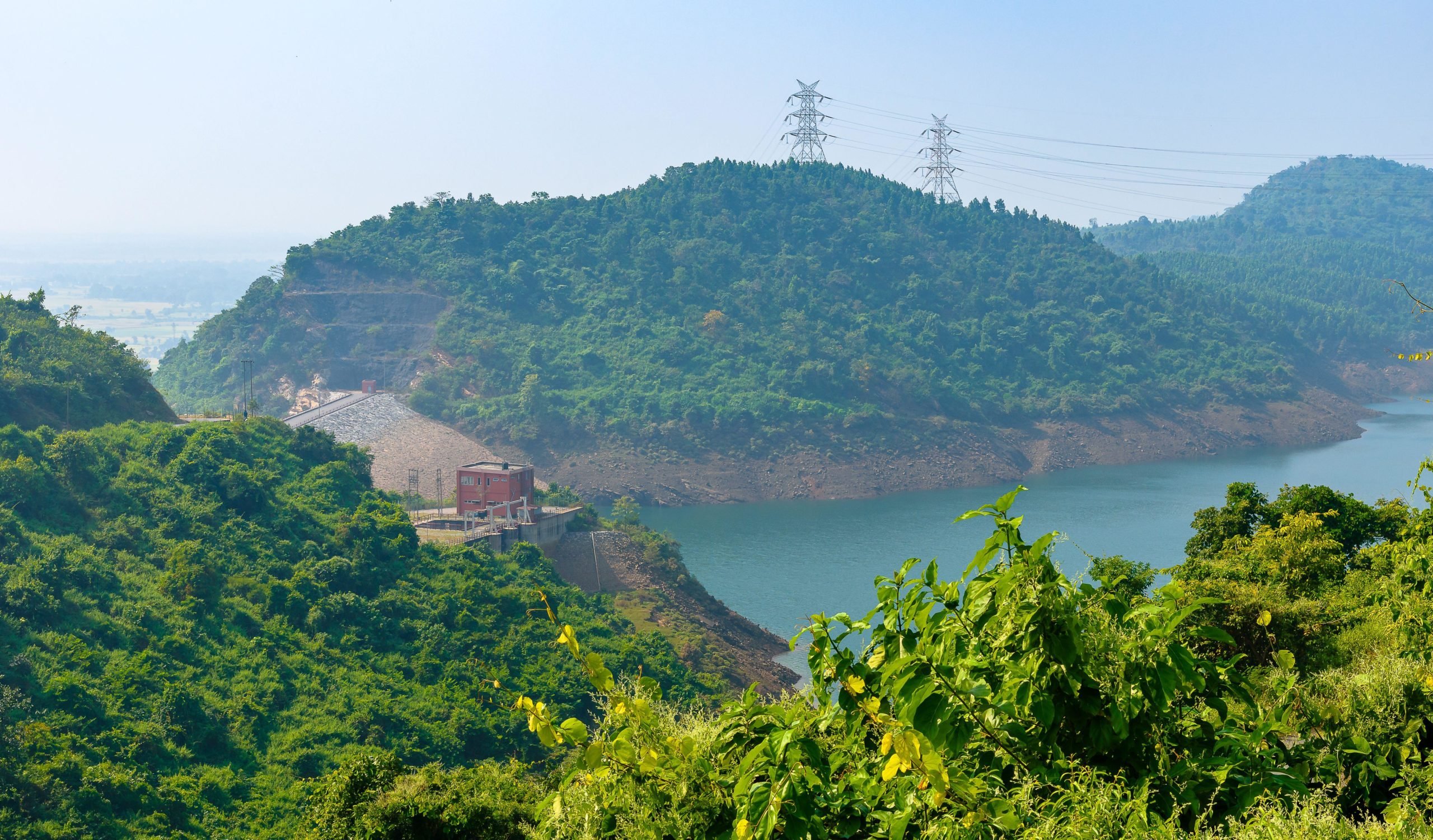 <p>In 2007, the Purulia Pumped Storage Project was completed in Purulia, West Bengal, causing the flooding of 442 hectares of land on which the livelihoods of local communities depended. Now, a similar pumped hydro project – the Turga Pumped Storage Project – has been approved nearby, which local communities have vowed to oppose. (Image: Abir Roy Barman / Alamy)</p>