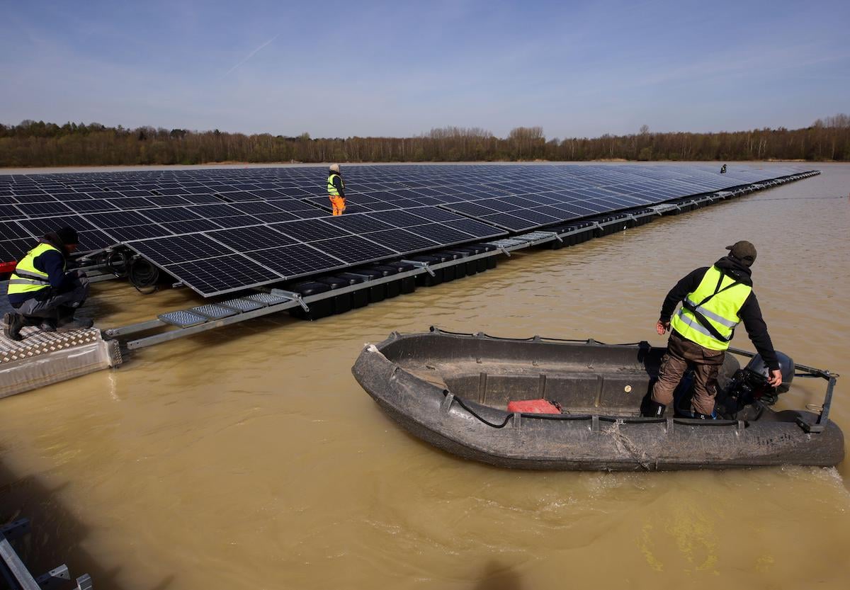 Installing floating solar panels on Lake Silbersee, Germany