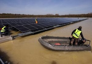 <p>Floating solar panels are installed on Lake Silbersee, Germany, earlier this year. Floating solar has been deployed in Europe and east Asia for <a href="https://chinadialogue.net/en/energy/floating-solar-ready-for-take-off/">nearly a decade</a>, and interest is now growing in India as the country scrambles to meet its renewable energy targets. (Image: Thilo Schmuelgen / Alamy)</p>