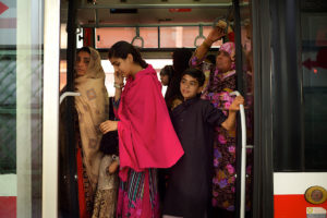 Women and children on a bus in Lahore, Pakistan