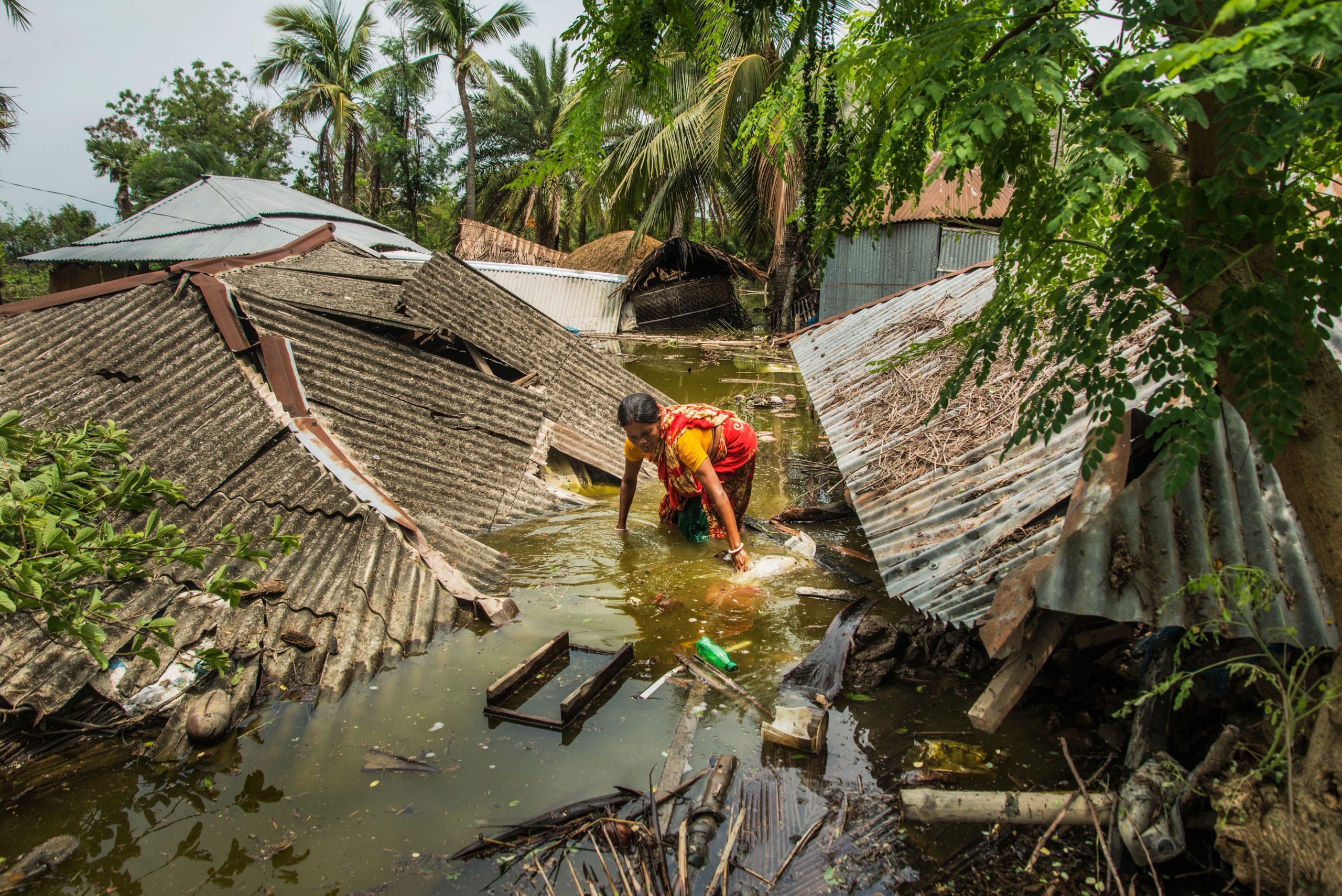 <p>Large areas of India and Bangladesh – such as this household in Khulna – suffered huge damage from Cyclone Amphan in 2020. Extreme weather events are set to become more severe in South Asia, a major driver of climate change-related loss and damage. (Image: Nazrul Islam / Alamy)</p>