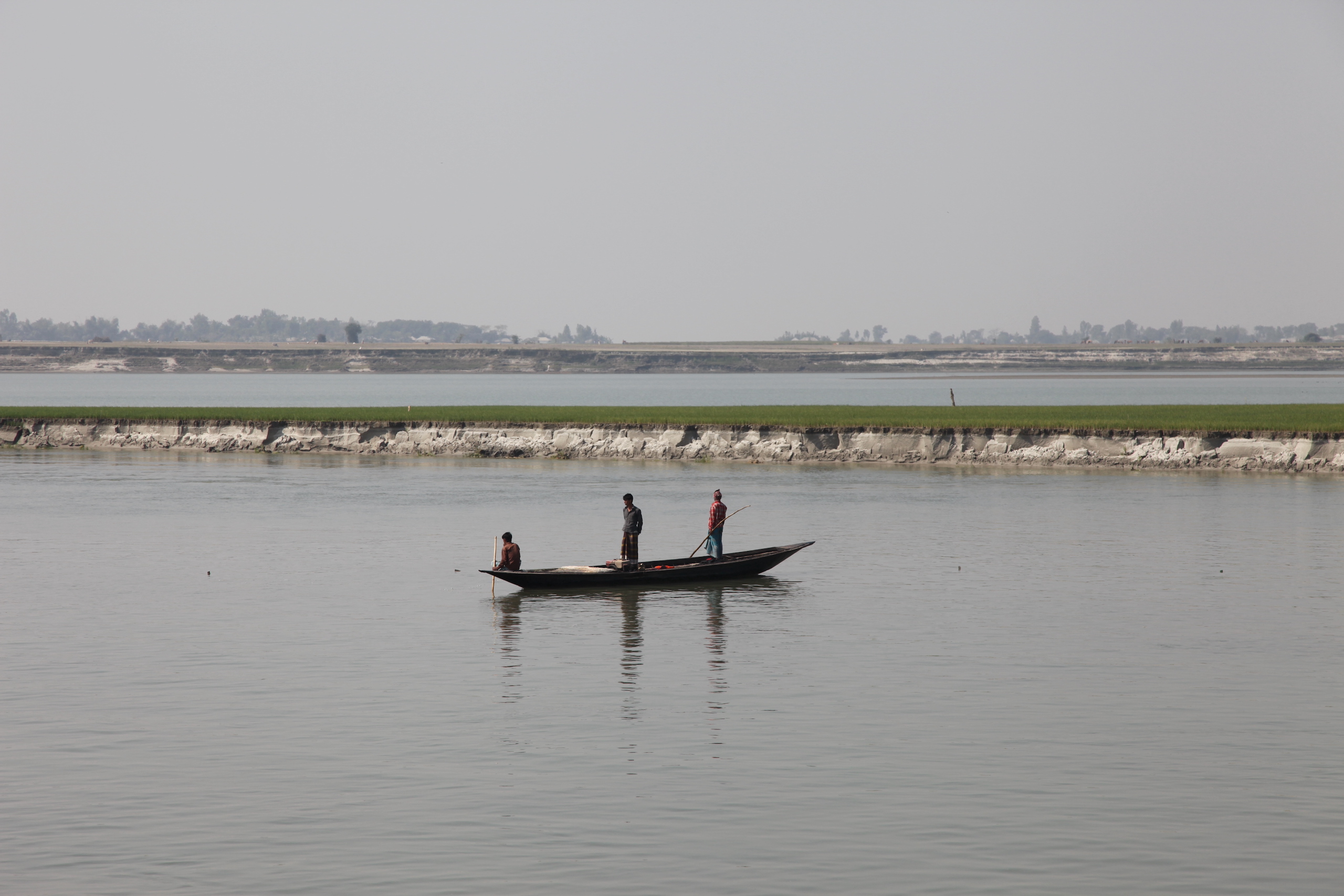 fishers on a boat on the brahmaputra yarlung tsangpo jamuna river