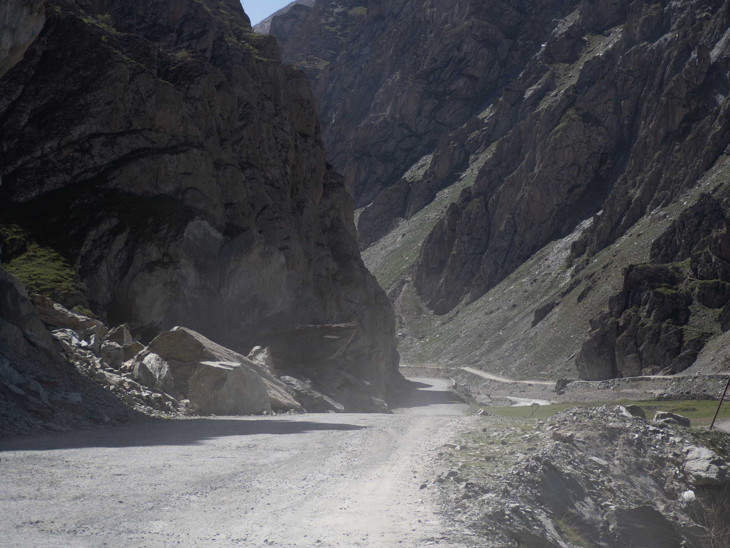 passes along an unpaved section of the Pamir Highway in Darvoz district