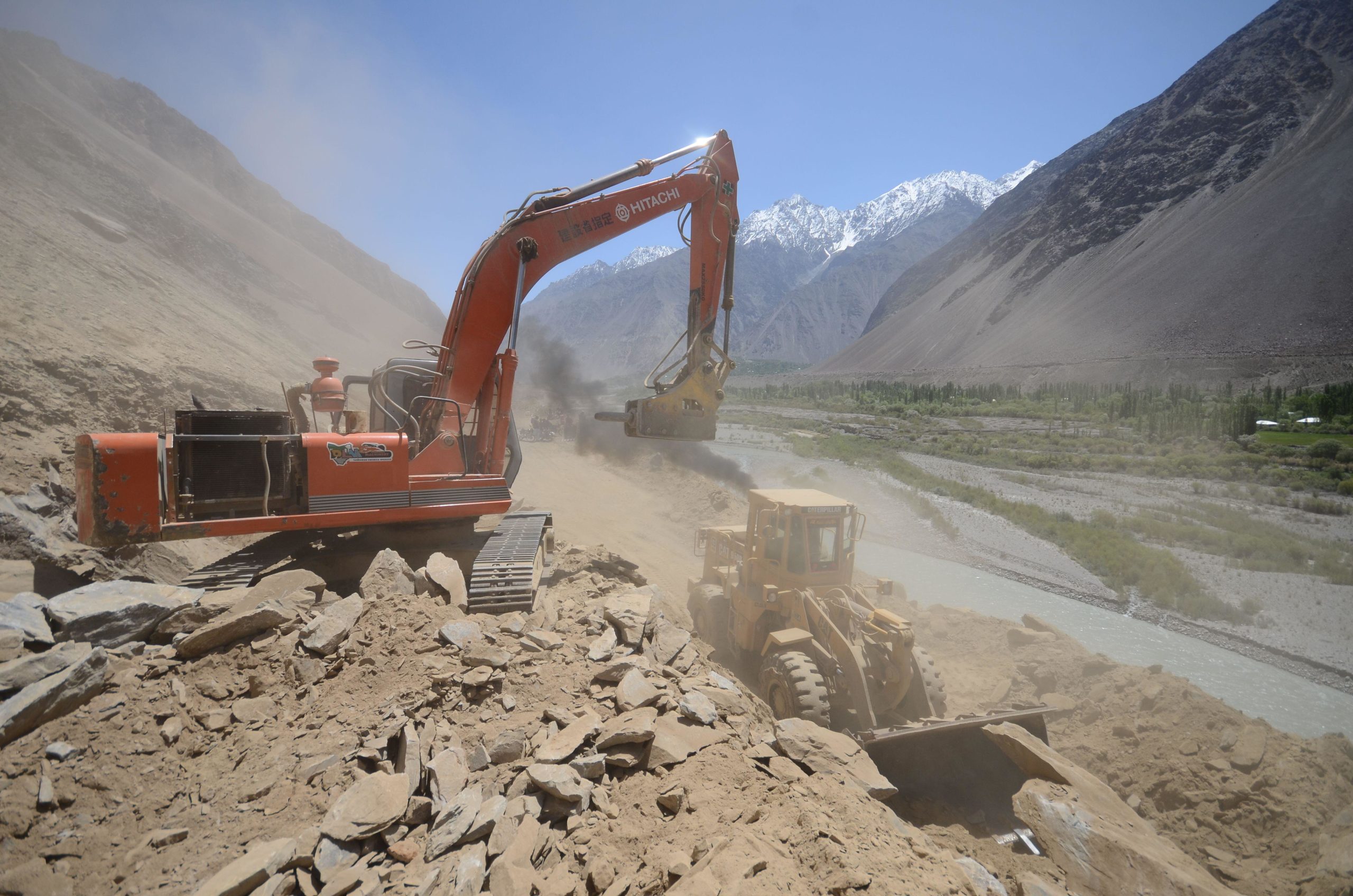 <p>Work in May 2022 on a road in Peshawar, Khyber Pakhtunkhwa province in Pakistan. The Pakistani government has decided to build a motorway between Peshawar and Kabul; experts say the expansion of rail and road corridors into Afghanistan highlights the need for environmental assessment that previous CPEC projects have rarely received. (Image: Alamy)</p>