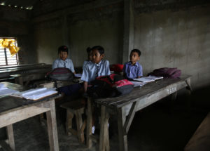 <p>Third-grade students in a classroom at Ma Sarada Shishu Niketan, the only private primary school on the island of Mousuni in the Sundarbans. The school charges 200 Indian rupees (USD 2.5) a month, which has become unaffordable for some families. (Image: <a href="https://www.instagram.com/myshotstories/">Cheena Kapoor</a> / The Third Pole)</p>
