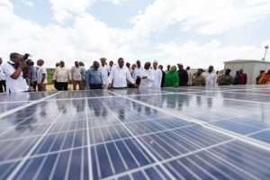 <p>Kenya’s former president, Uhuru Kenyatta, attends the inauguration ceremony of the 50MW Garissa solar power plant in Kenya, December 2019. The project was designed and constructed by China Jiangxi International Economic &#038; Technological Cooperation Company. (Image: Xie Han / Alamy)</p>