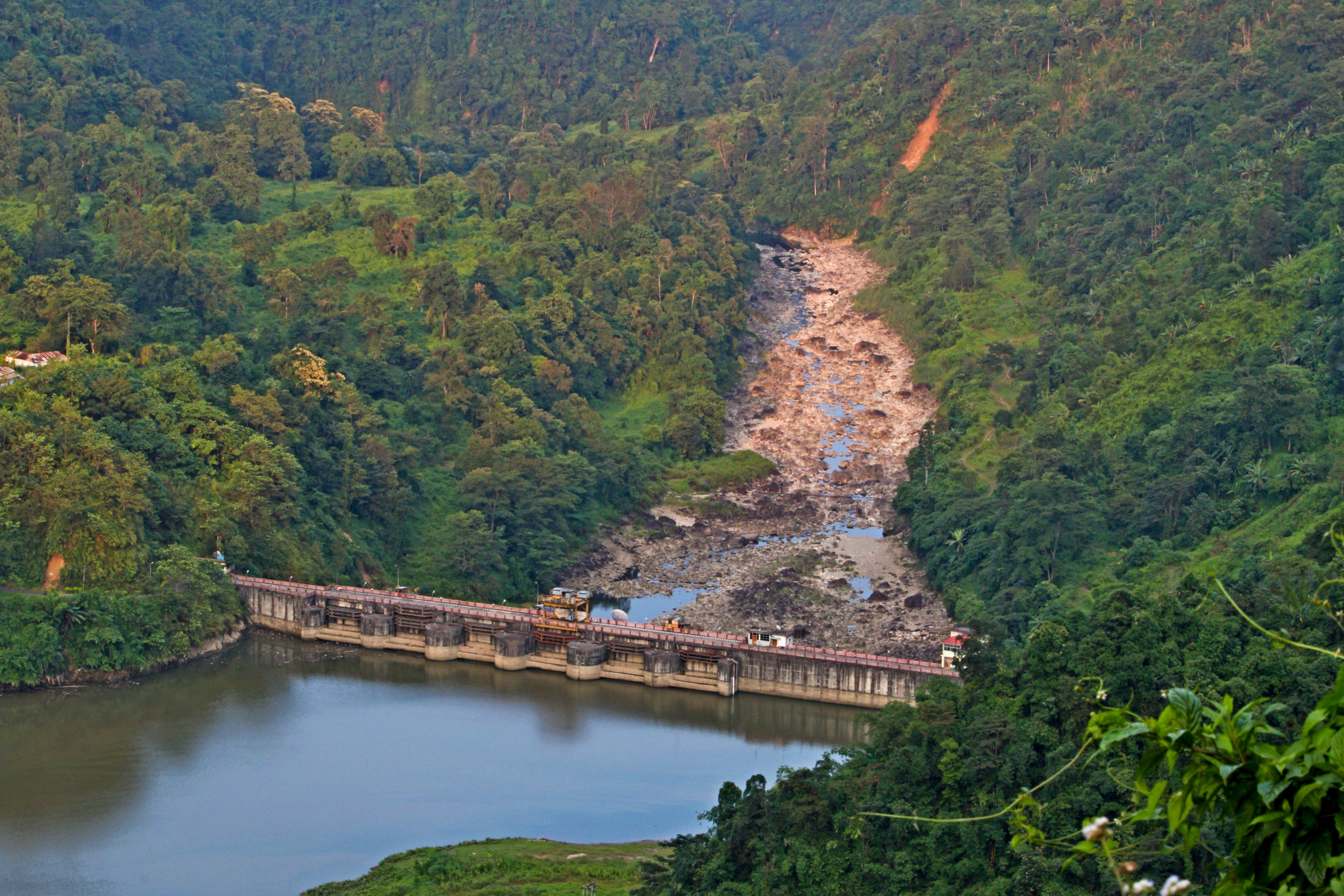 <p>The Ranganadi dam in Arunachal Pradesh. In February 2019 the dam released an unprecedented amount of silt, with severe impacts for the river’s biodiversity and the livelihoods of people who live along its banks. (Image: Karen Conniff / <a href="https://www.flickr.com/photos/water_alternatives/40760068185/">Flickr</a>, <a href="https://creativecommons.org/licenses/by-nc/2.0/">CC BY-NC 2.0</a>)</p>
