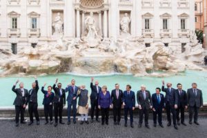 World leaders throw coins into the Trevi Fountain in front of the Palazzo Poli during the G20 Summit meeting October 31, 2021 in Rome, Italy
