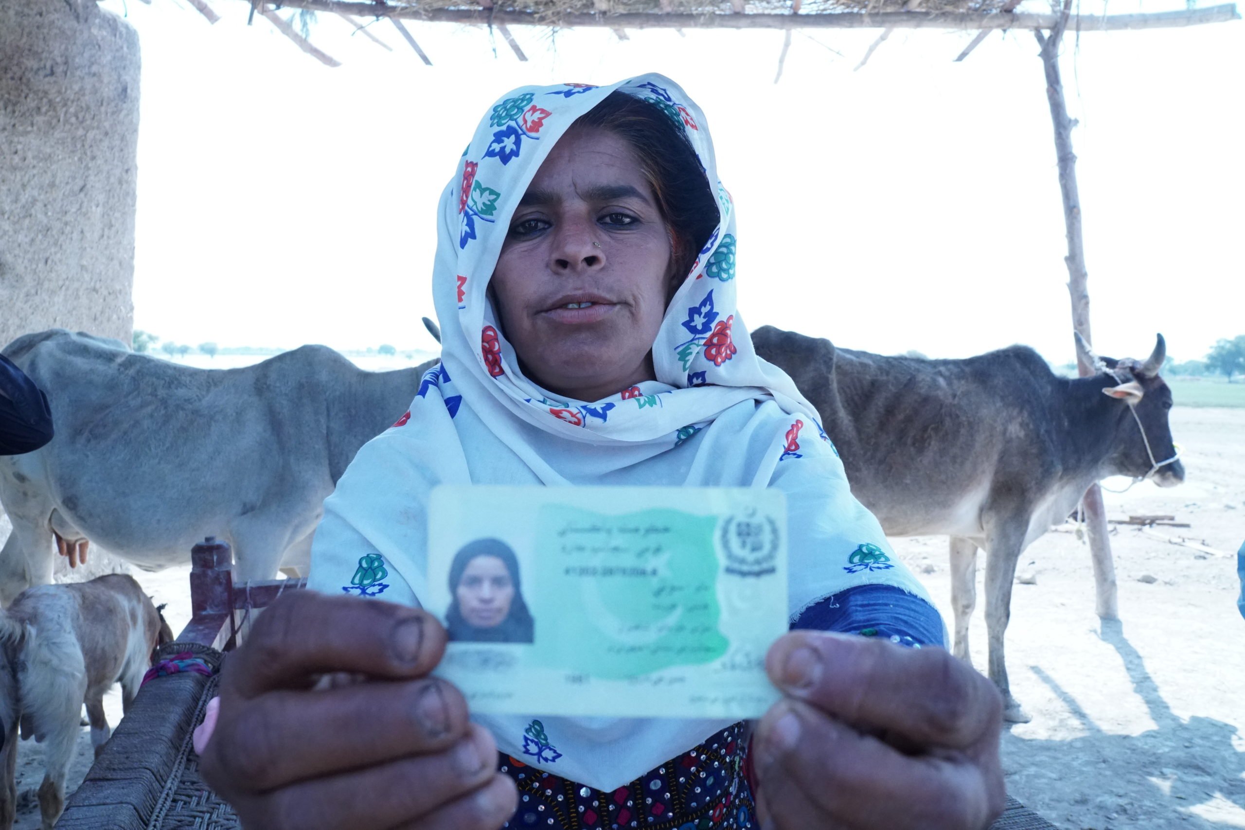 woman displaying identity card