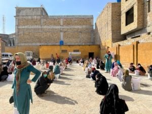 Trans people affected by floods in Pakistan’s Balochistan province gather to receive aid from the non-profit Al-Khidmat Foundation in partnership with Unilever Pakistan