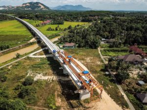 <p>The East Coast Rail Line, peninsular Malaysia, April 2023. The <a href="https://chinadialogue.net/en/business/11842-photo-journey-malaysia-s-new-china-funded-railway/">line</a> is planned to link up to a wider pan-Asian network of railways currently under construction or planned as part of the Belt and Road Initiative. (Image: Alamy)</p>