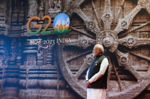 Indian Prime Minister Narendra Modi in front of G20 India 2023 sign