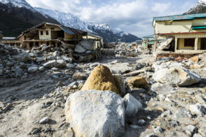 boulders and destroyed buildings