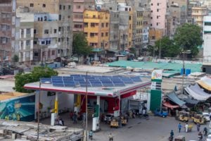 <p>This solar-pannelled petrol station in Karachi, Pakistan, illustrates how the world is pushing for new energy while still holding on to fossil fuels (Image: Muhammad Aqib Yasin / Alamy)</p>